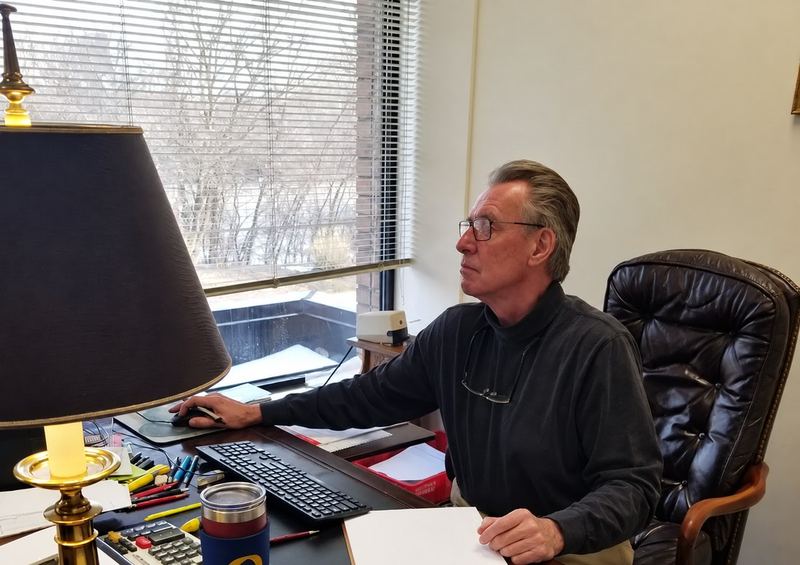 William D. Briggs at his desk